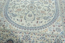 Close-up detail of 2000s Nain rug from Iran / Persia showing Wool weave