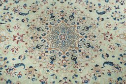 Central medallion detail of 2000s Nain rug from Iran / Persia