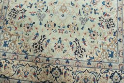 Close-up detail of 2000s Nain rug from Iran / Persia showing Wool weave