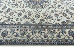 Close-up detail of 2000s Nain rug from Iran / Persia showing Wool weave