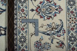 Central medallion detail of 2000s Nain rug from Iran / Persia