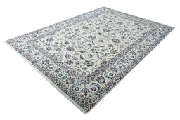 Corner detail of 2000s Nain rug showing border pattern and Wool pile
