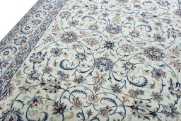 Backside of handmade 2000s Nain rug showing knot structure and weave density