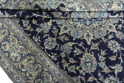 Close-up detail of 2000s Nain rug from Iran / Persia showing Wool weave