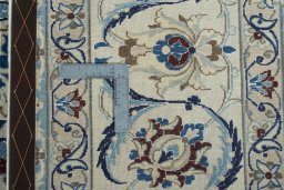 Backside of handmade 2000s Nain rug showing knot structure and weave density