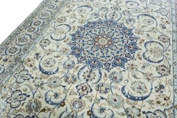 Backside of handmade 2000s Nain rug showing knot structure and weave density
