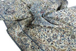 Surface texture of 2000s Nain rug with natural Wool and intricate pattern