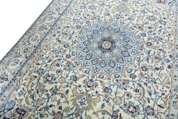 Backside of handmade 2000s Nain rug showing knot structure and weave density