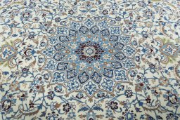 Central medallion detail of 2000s Nain rug from Iran / Persia