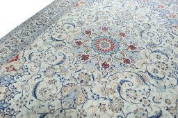 Backside of handmade 2000s Nain rug showing knot structure and weave density