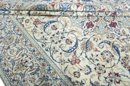 Close-up detail of 2000s Nain rug from Iran / Persia showing Wool weave