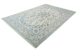 Corner detail of 2000s Nain rug showing border pattern and Wool pile