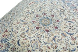 Backside of handmade 2000s Nain rug showing knot structure and weave density
