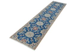 Corner detail of 2000s Nain rug showing border pattern and Wool pile