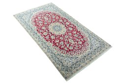 Close-up detail of 2000s Nain rug from Iran / Persia showing Wool weave