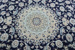 Central medallion detail of 2000s Nain rug from Iran / Persia