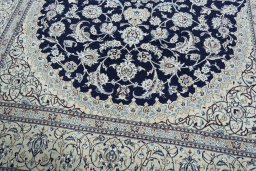 Close-up detail of 2000s Nain rug from Iran / Persia showing Wool weave