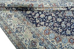 Close-up detail of 2000s Nain rug from Iran / Persia showing Wool weave