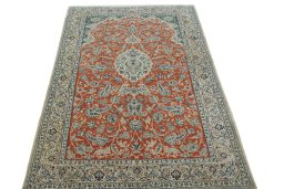 Surface texture of 1970s Nain rug with natural Cork and intricate pattern