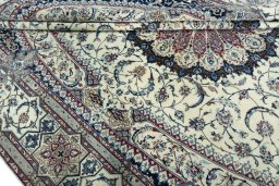 Close-up detail of 2000s Nain rug from Iran / Persia showing Cork weave