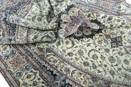 Surface texture of 2000s Nain rug with natural Cork and intricate pattern