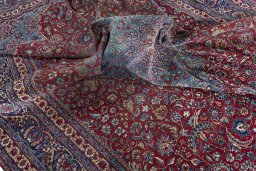 Surface texture of 1930s Nain rug with natural Wool and intricate pattern