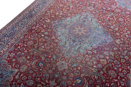 Backside of handmade 1930s Nain rug showing knot structure and weave density