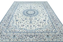 Surface texture of 2000s Nain rug with natural Wool and intricate pattern