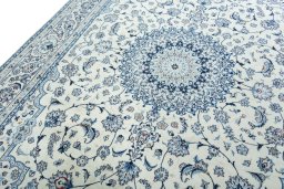 Backside of handmade 2000s Nain rug showing knot structure and weave density