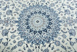 Central medallion detail of 2000s Nain rug from Iran / Persia