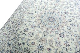 Backside of handmade 2000s Nain rug showing knot structure and weave density