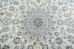 Central medallion detail of 2000s Nain rug from Iran / Persia