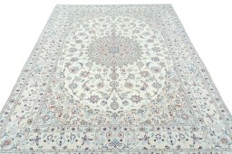 Surface texture of 2000s Nain rug with natural Wool and intricate pattern
