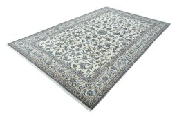 Corner detail of 2000s Nain rug showing border pattern and Wool pile