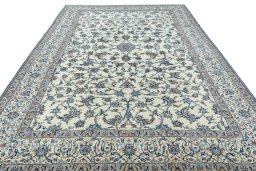 Surface texture of 2000s Nain rug with natural Wool and intricate pattern