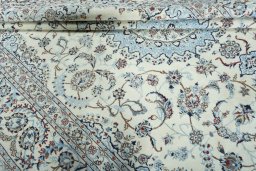 Close-up detail of 2000s Nain rug from Iran / Persia showing Wool weave