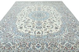 Surface texture of 2000s Nain rug with natural Wool and intricate pattern