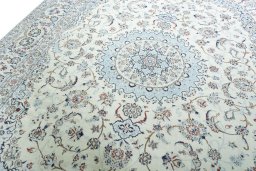Backside of handmade 2000s Nain rug showing knot structure and weave density