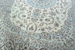 Close-up detail of 2000s Nain rug from Iran / Persia showing Wool weave