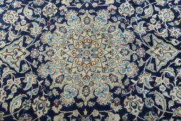 Central medallion detail of 2000s Nain rug from Iran / Persia