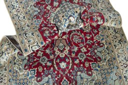 Surface texture of 2000s Nain rug with natural Wool and intricate pattern