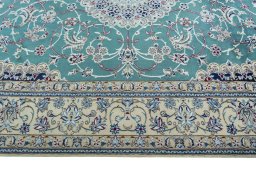 Corner detail of 1970s Nain rug showing border pattern and Wool pile