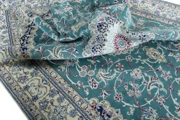 Surface texture of 1970s Nain rug with natural Wool and intricate pattern