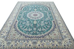 Surface texture of 1970s Nain rug with natural Wool and intricate pattern