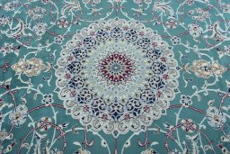Central medallion detail of 1970s Nain rug from Iran / Persia