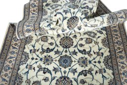 Close-up detail of 1970s Nain rug from Iran / Persia showing Wool weave