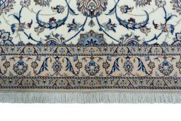 Close-up detail of 1970s Nain rug from Iran / Persia showing Wool weave