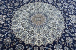 Central medallion detail of 1970s Nain rug from Iran / Persia