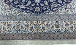 Full view of 1970s Nain rug from Iran / Persia, 408 × 313 cm in Blue tones