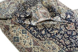 Surface texture of 1970s Nain rug with natural Cork and intricate pattern